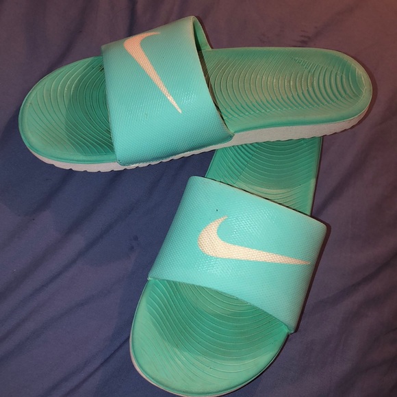 teal nike slides